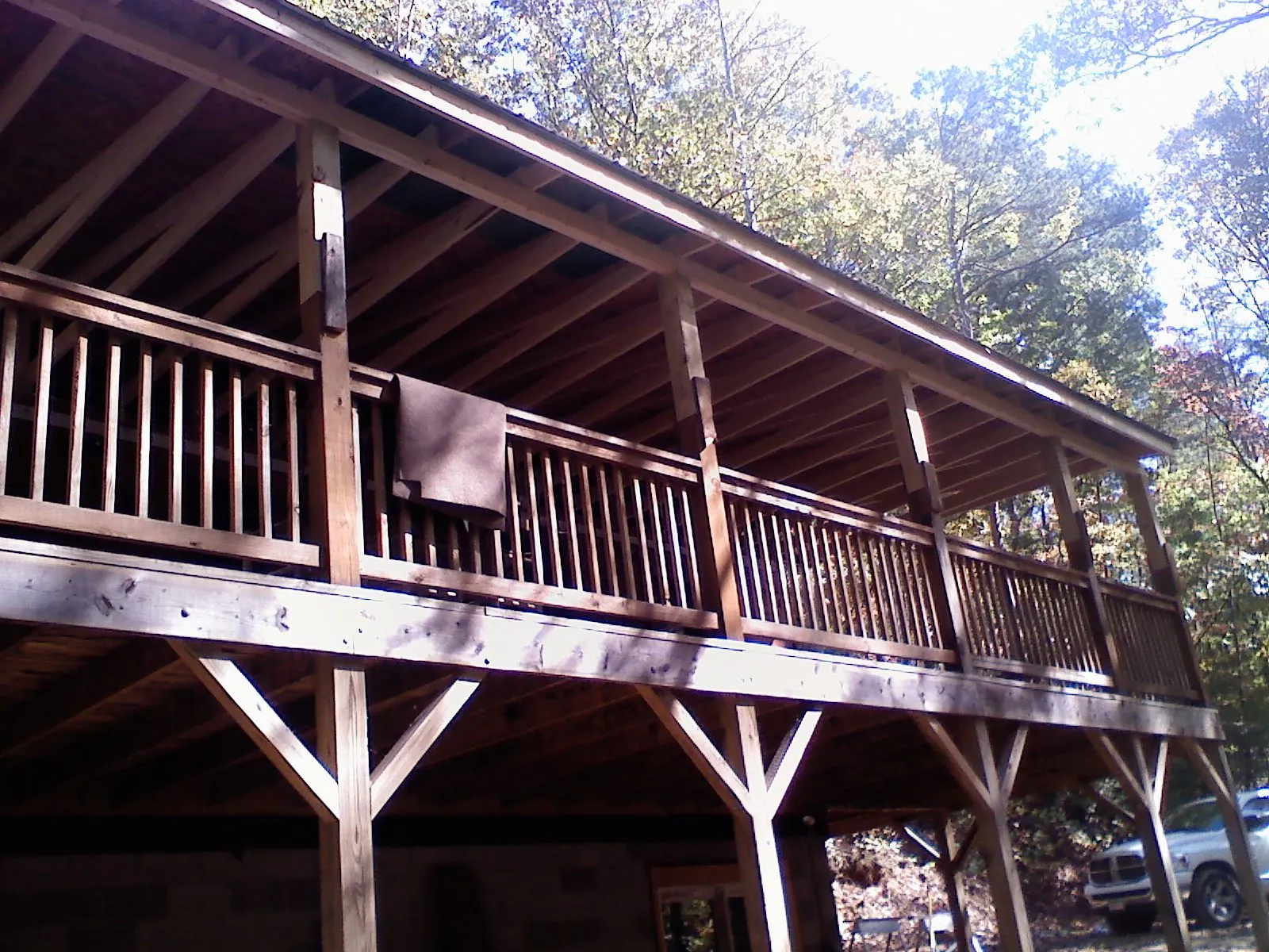Timber framing under a new elevated porch and deck — Roof Leak Repair in Iola by Roofing Brothers